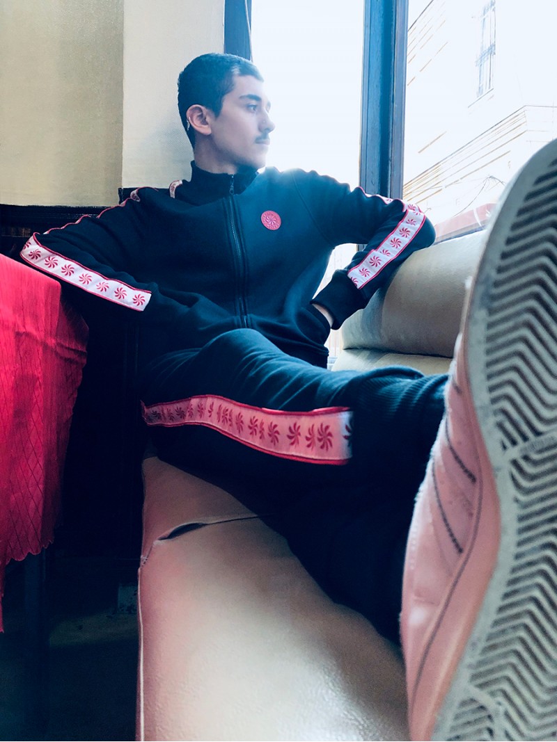 Pepper Sun, black track pants